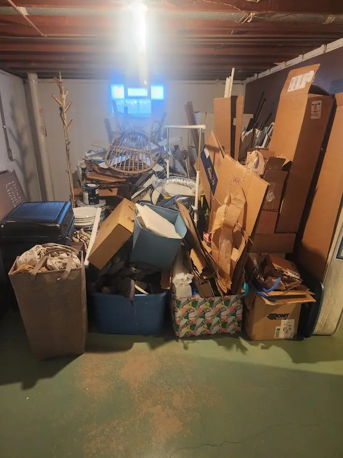 Roll-off dumpster container at job site for 6 Yard Dumpster Rental in Holland